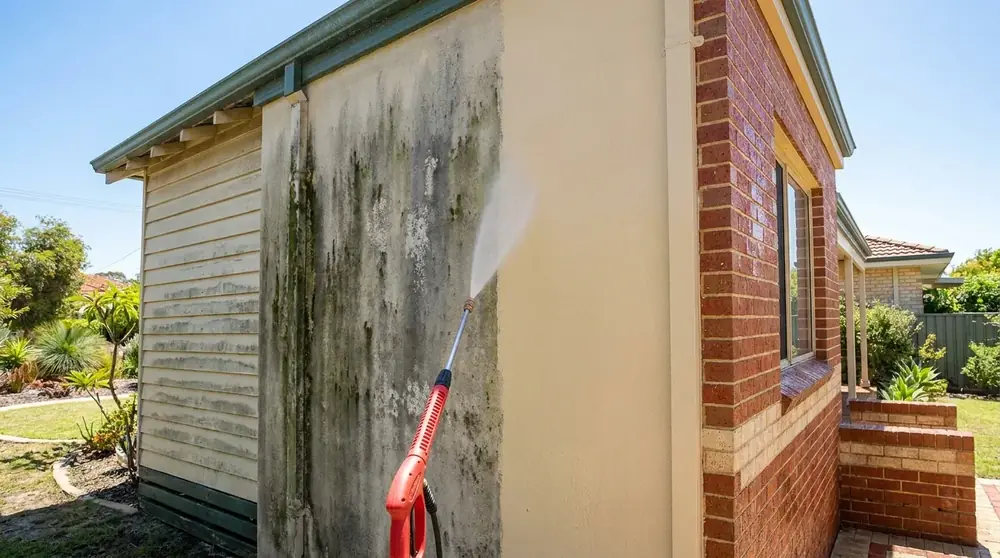 Pressure washing the exterior of a Perth home